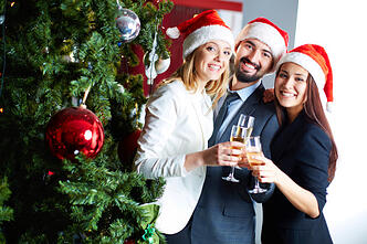 Employees_next_to_Christmas_Tree_appreciates_passion_and_provision