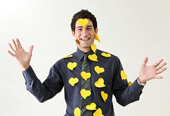 Inbound Marketer with postit's to remind him of stuff