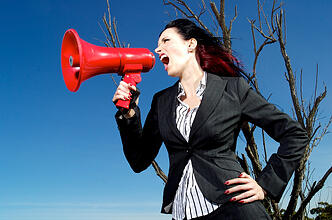 Woman_promoting_her_successful_small_business_with_megaphone