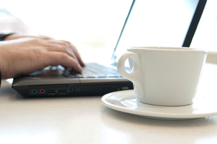 typing and coffee cup