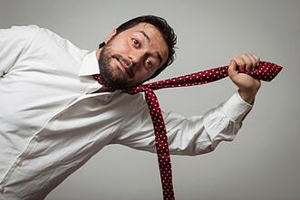 guy pulling tie