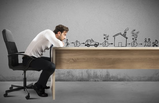 Businessman thinking about future goals