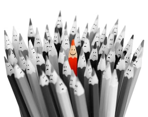 red_smiling_pencil_among_sad_gray_pencils