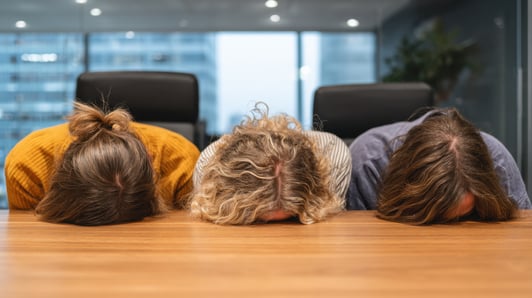 frustrated_leaders_with_heads_on_table